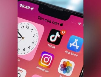 Create a wallpaper with your name below the iPhone notch.